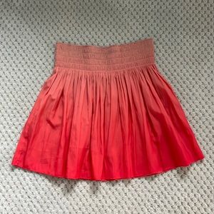 red and orange skirt